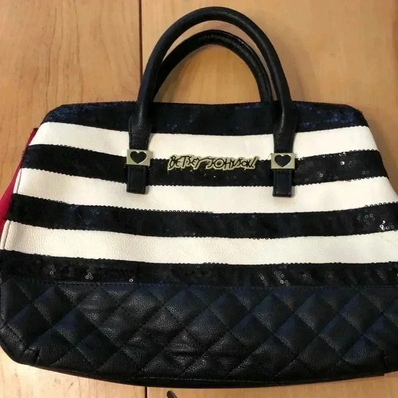 Betsey Johnson Handbags - Betsey Johnson black and white sequined bag with red sides.  Faux leather